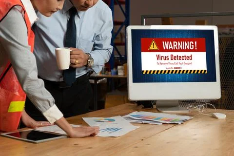 Virus warning alert on computer screen detected modish cyber threat Stock Photos