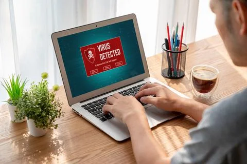 Virus warning alert on computer screen detected modish cyber threat Stock Photos
