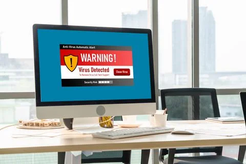 Virus warning alert on computer screen detected modish cyber threat Foto stock