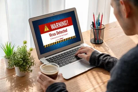 Virus warning alert on computer screen detected modish cyber threat Stock Photos