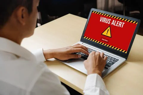 Virus warning alert on computer screen detected modish cyber threat 写真素材