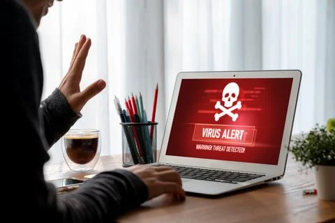 Virus warning alert on computer screen detected modish cyber threat Stock Photos
