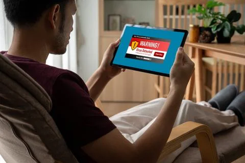 Virus warning alert on computer screen detected modish cyber threat Stock Photos