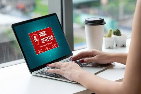 Virus warning alert on computer screen detected modish cyber threat Stock Photos