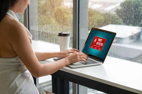 Virus warning alert on computer screen detected modish cyber threat Stock Photos