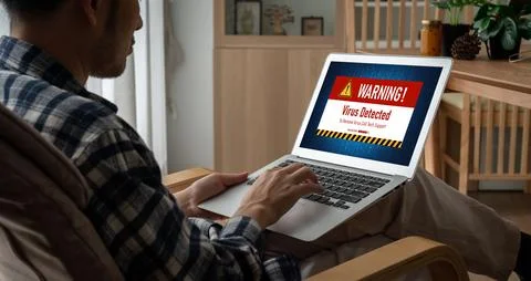 Virus warning alert on computer screen detected modish cyber threat Stock Photos