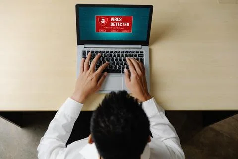 Virus warning alert on computer screen detected modish cyber threat Stock Photos