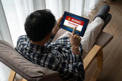 Virus warning alert on computer screen detected modish cyber threat Stock Photos