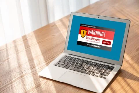 Virus warning alert on computer screen detected modish cyber threat Stock Photos
