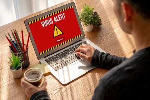 Virus warning alert on computer screen detected modish cyber threat Stock Photos