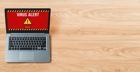 Virus warning alert on computer screen detected modish cyber threat Stock Photos