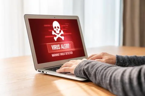 Virus warning alert on computer screen detected modish cyber threat Foto stock