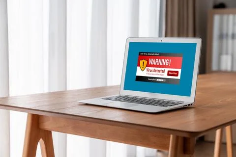 Virus warning alert on computer screen detected modish cyber threat Stock Photos