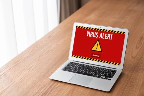Virus warning alert on computer screen detected modish cyber threat Stock Photos