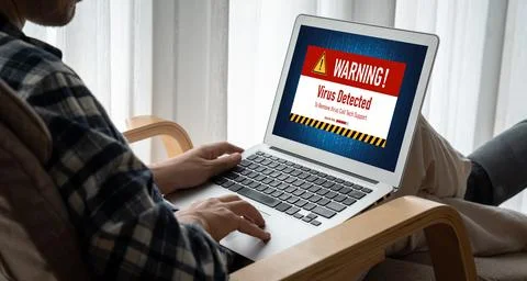 Virus warning alert on computer screen detected modish cyber threat Stock Photos
