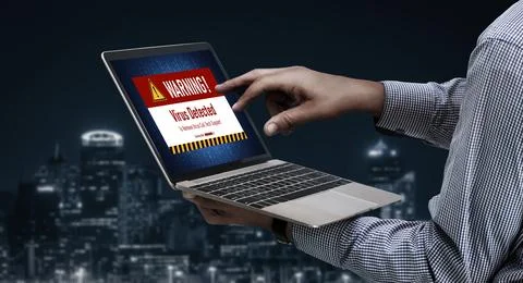 Virus warning alert on computer screen detected modish cyber threat Stock Photos