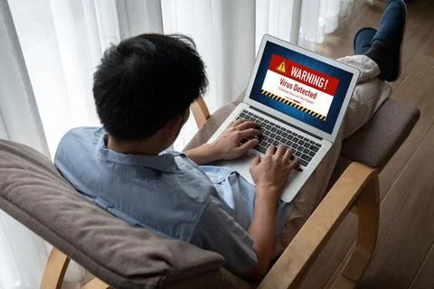 Virus warning alert on computer screen detected modish cyber threat Stock Photos