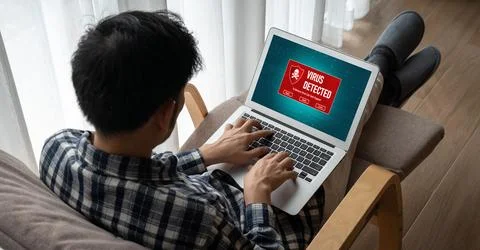 Virus warning alert on computer screen detected modish cyber threat Stock Photos