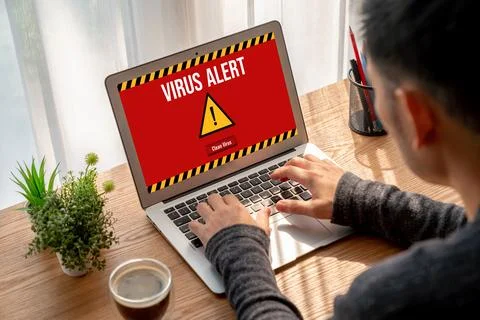 Virus warning alert on computer screen detected modish cyber threat 写真素材