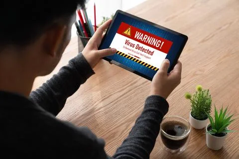 Virus warning alert on computer screen detected modish cyber threat Stock Photos