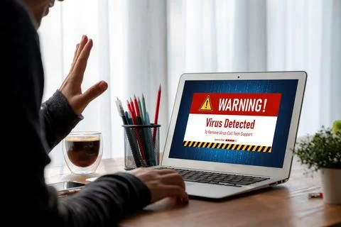 Virus warning alert on computer screen detected modish cyber threat Stock Photos