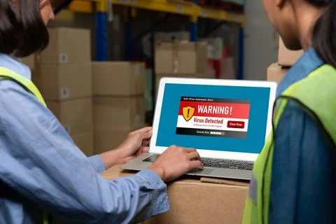Virus warning alert on computer screen detected modish cyber threat Stock Photos