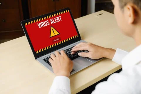 Virus warning alert on computer screen detected modish cyber threat 写真素材