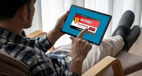 Virus warning alert on computer screen detected modish cyber threat Stock Photos