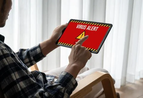 Virus warning alert on computer screen detected modish cyber threat Stock Photos