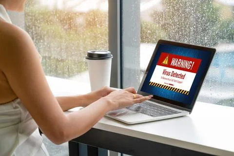 Virus warning alert on computer screen detected modish cyber threat Stock Photos