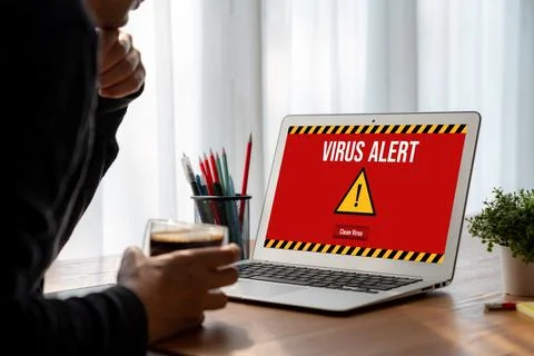 Virus warning alert on computer screen detected modish cyber threat Stock Photos