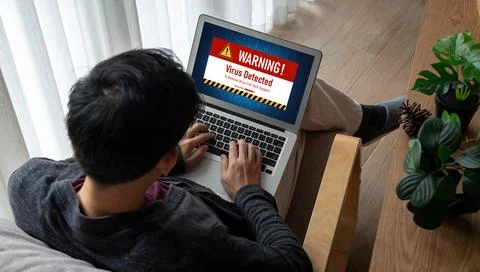 Virus warning alert on computer screen detected modish cyber threat Stock Photos