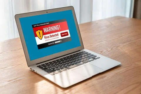 Virus warning alert on computer screen detected modish cyber threat Stock Photos