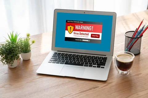 Virus warning alert on computer screen detected modish cyber threat Foto stock