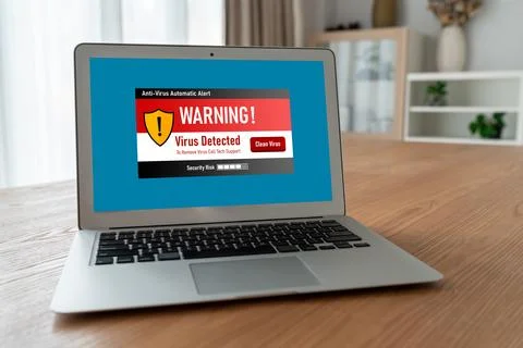 Virus warning alert on computer screen detected modish cyber threat Foto stock