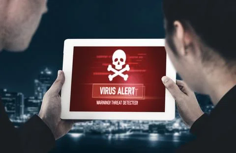 Virus warning alert on computer screen detected modish cyber threat Stock Photos