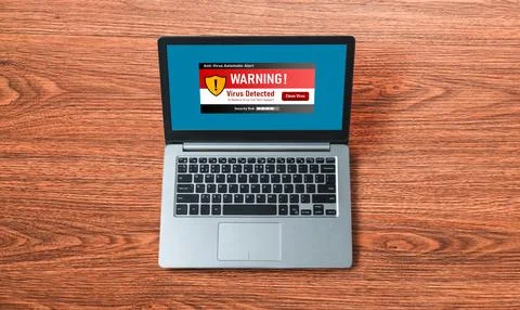 Virus warning alert on computer screen detected modish cyber threat Stock Photos