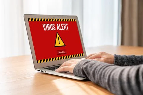 Virus warning alert on computer screen detected modish cyber threat Stock Photos