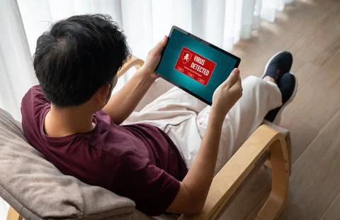Virus warning alert on computer screen detected modish cyber threat Stock Photos