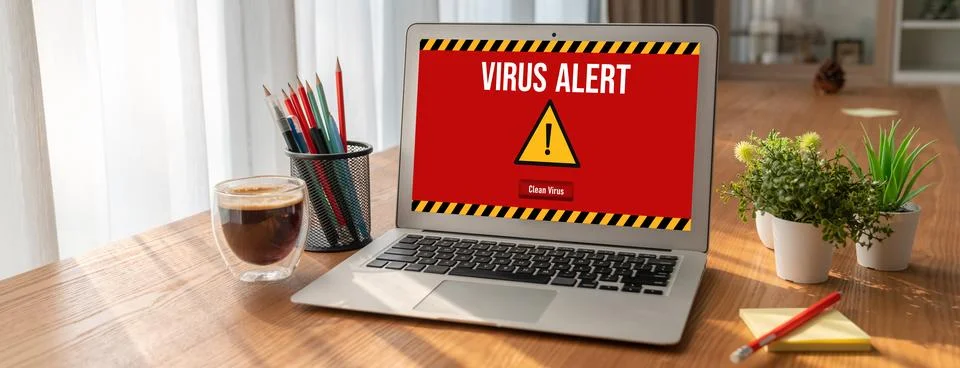 Virus warning alert on computer screen detected modish cyber threat Stock Photos
