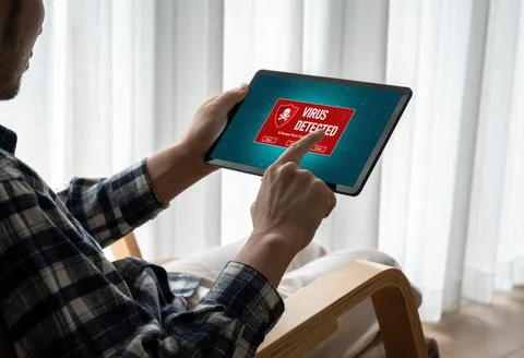Virus warning alert on computer screen detected modish cyber threat Stock Photos