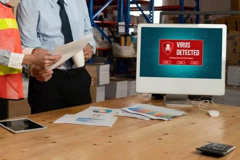 Virus warning alert on computer screen detected modish cyber threat Stock Photos