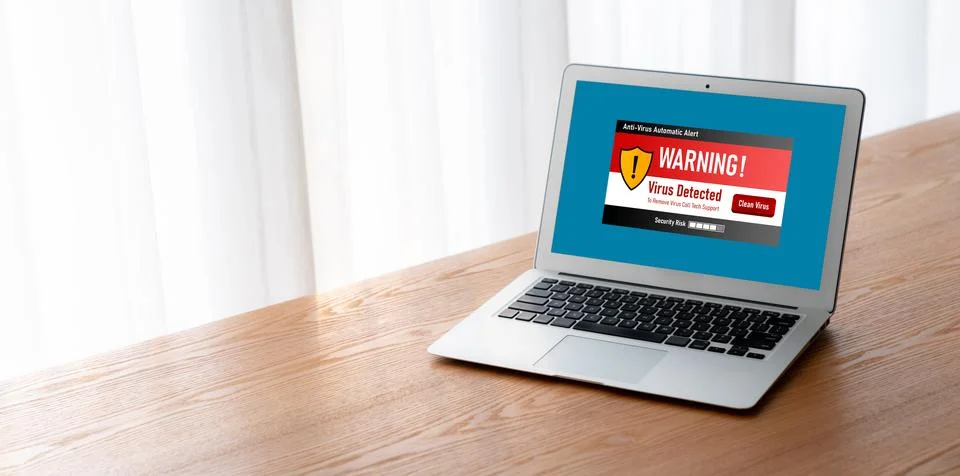 Virus warning alert on computer screen detected modish cyber threat Stock Photos