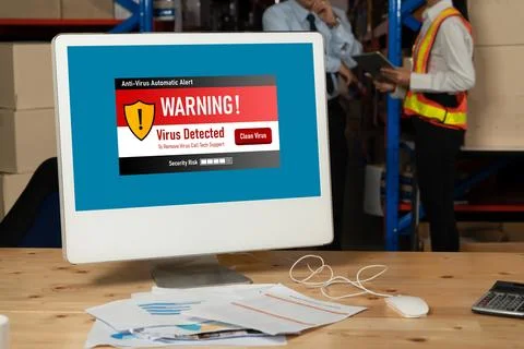 Virus warning alert on computer screen detected modish cyber threat Stock Photos