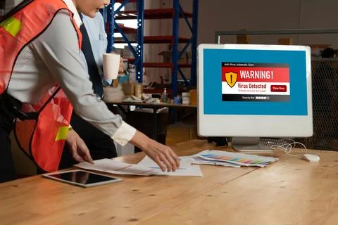 Virus warning alert on computer screen detected modish cyber threat Stock Photos