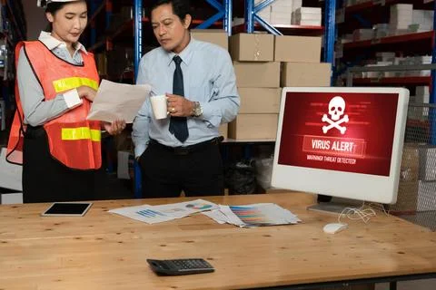Virus warning alert on computer screen detected modish cyber threat Stock Photos