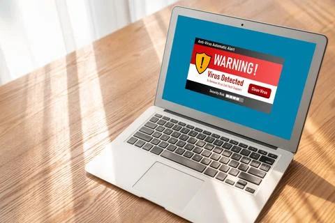 Virus warning alert on computer screen detected modish cyber threat Foto stock