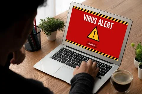 Virus warning alert on computer screen detected modish cyber threat Stock Photos