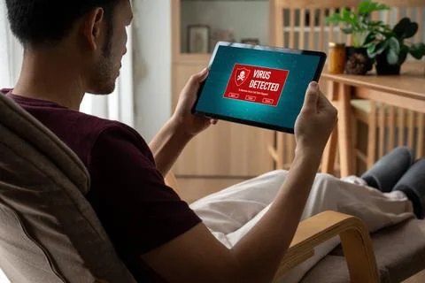 Virus warning alert on computer screen detected modish cyber threat Stock Photos