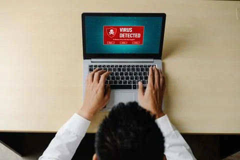 Virus warning alert on computer screen detected modish cyber threat Stock Photos